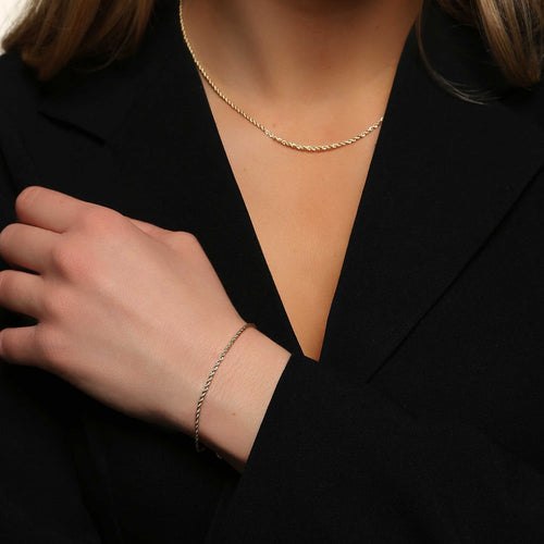 Exibit small brace Guldpläterad